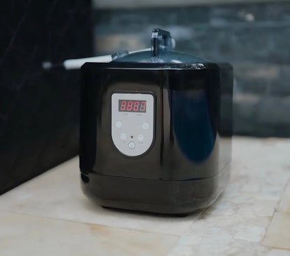 Black electronic device with digital display on a marble surface