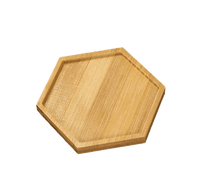 Hexagonal wooden tray on a white background
